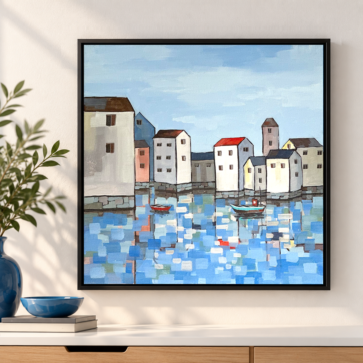 Painting of a coastal village with colourful houses mirrored in still harbor water below, 18" x 18" original painting